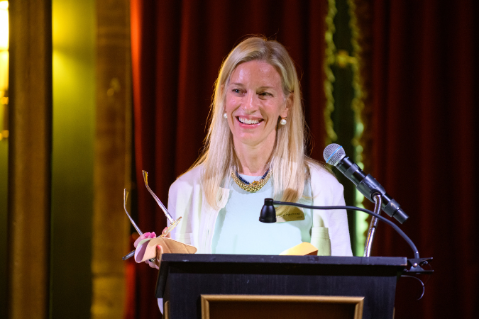 President Lynne Hemmer speaking at an event
